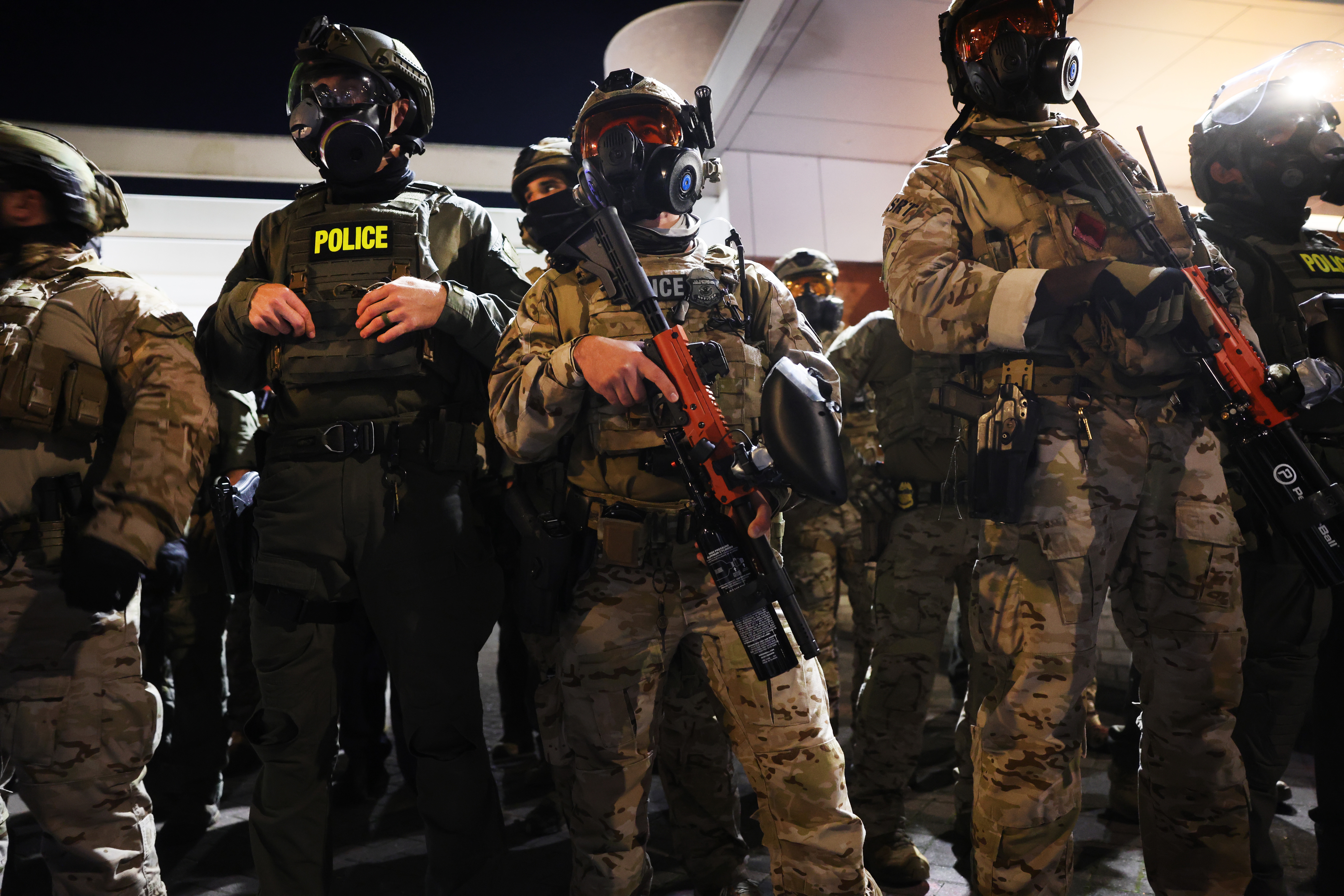 Federal agents, including members of the Department of Homeland Security, Border Patrol, and the police, attempt to keep protesters back outside a downtown U.S. Immigration and Customs Enforcement facility on Oct. 5, 2025 in Portland, Oregon. (Getty Images)