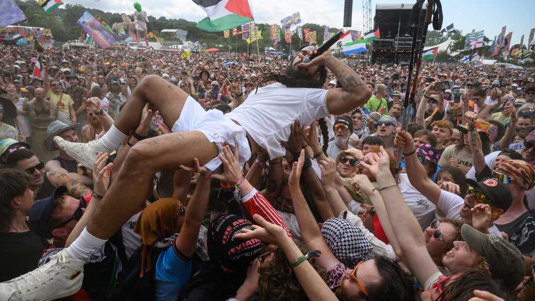 Bobby Vylan of Bob Vylan crowdsurfs in front of the West Holts stage during day four of Glastonbury festival 2025 on June 28 in Glastonbury, England.