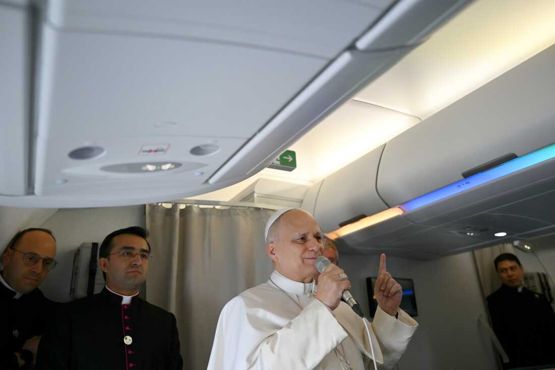 Pope Leo XIV speaks to journalists aboard his flight bound for Algiers’ Houari Boumédiène International Airport on Monday, April 13, 2026, at the start of an 11-day apostolic journey to Africa.