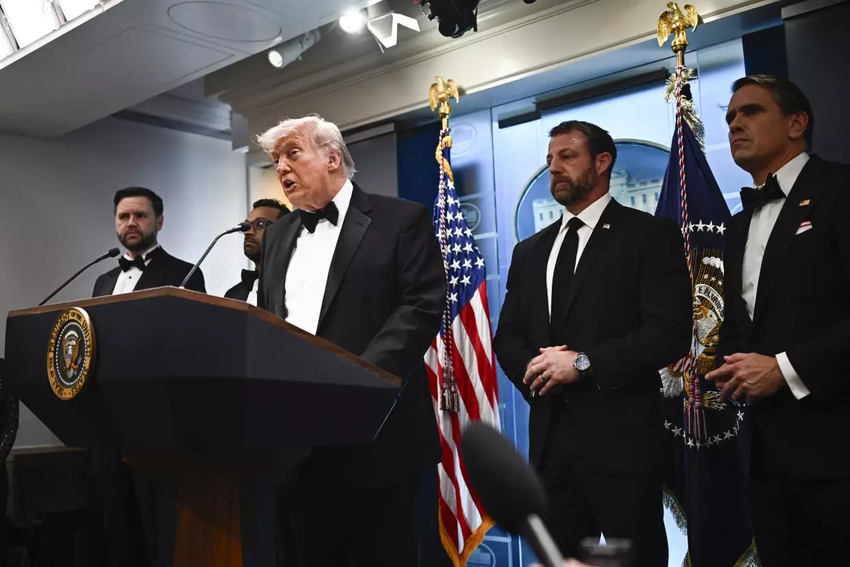 President Trump speaks from the White House, flanked by Vice President Vance, FBI Director Kash Patel, Secretary of Homeland Security Markwayne Mullin and Acting Attorney General Todd Blanche, shortly after a shooting incident at the White House Correspondents' Dinner.