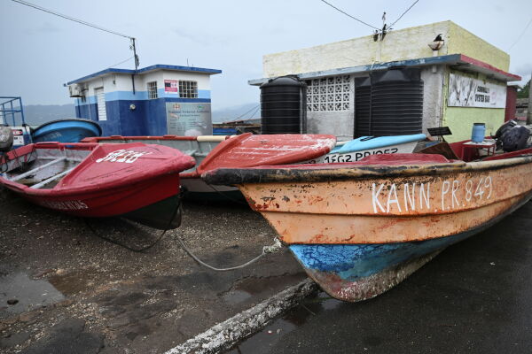 Fishing boats are tied up on Queen Street in Port Royal in Kingston, Jamaica on Oct. 27.