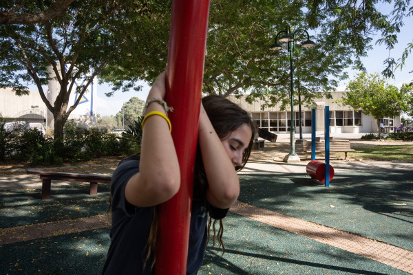 A 13 year old Kibbutz member plays with her friends on September 23 in Kibbutz Beeri.