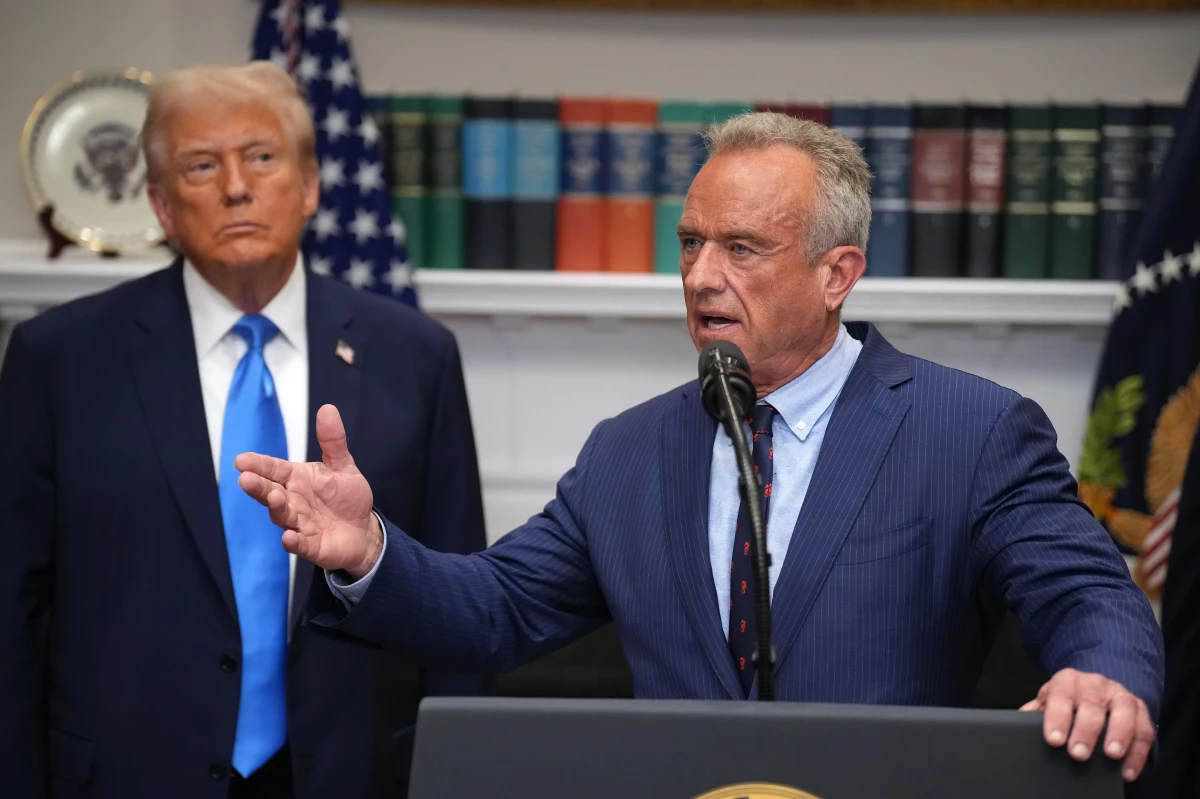 President Trump (left) looks on as Health and Human Services Secretary Robert F. Kennedy Jr. answers questions after delivering an announcement on 'significant medical and scientific findings for America's children' in the Roosevelt Room of the White House on Sept. 22 in Washington, D.C.