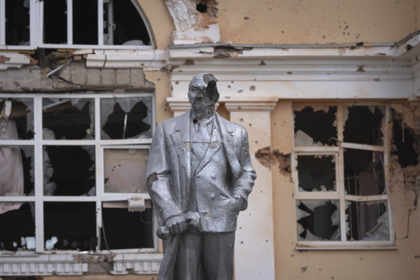 A damaged statue of Soviet Union founder Vladimir Lenin in a central square in Sudzha, in the Kursk region of western Russia, on Aug. 16. Ukrainian troops say they've taken control of Sudzha, one of more than 80 towns and villages they've captured since a cross-border invasion of Russia on Aug. 6.