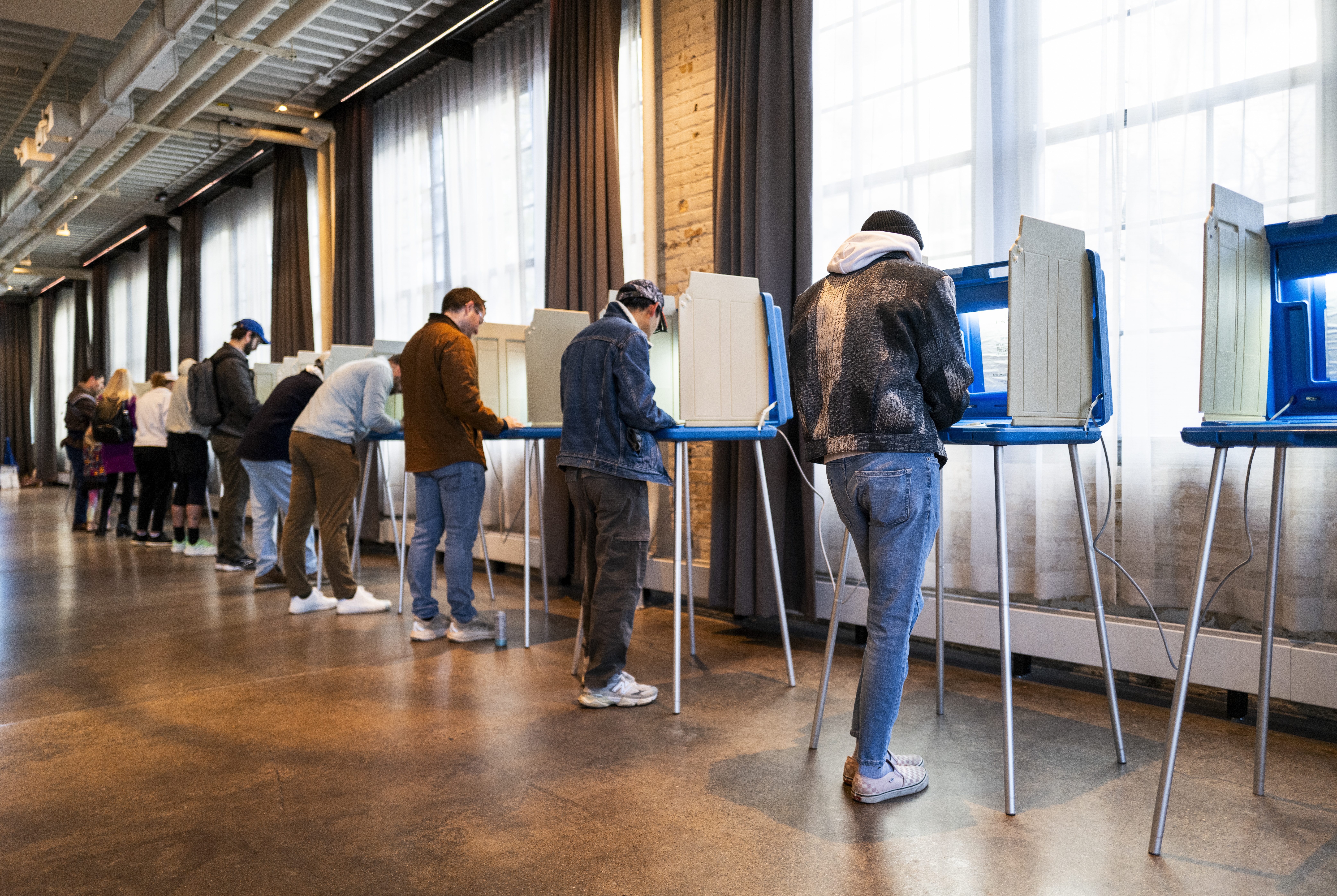 Voters fill out their ballots at a polling place on Election Day, Nov. 4, in Minneapolis, Minn.