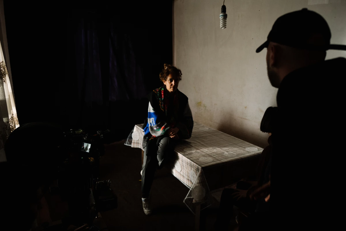 Dea Kulumbegashvili, left, is seen on the set of her feature film April, which centers around a doctor providing abortions to in rural Georgia, at the foot of the Caucasus Mountains.
