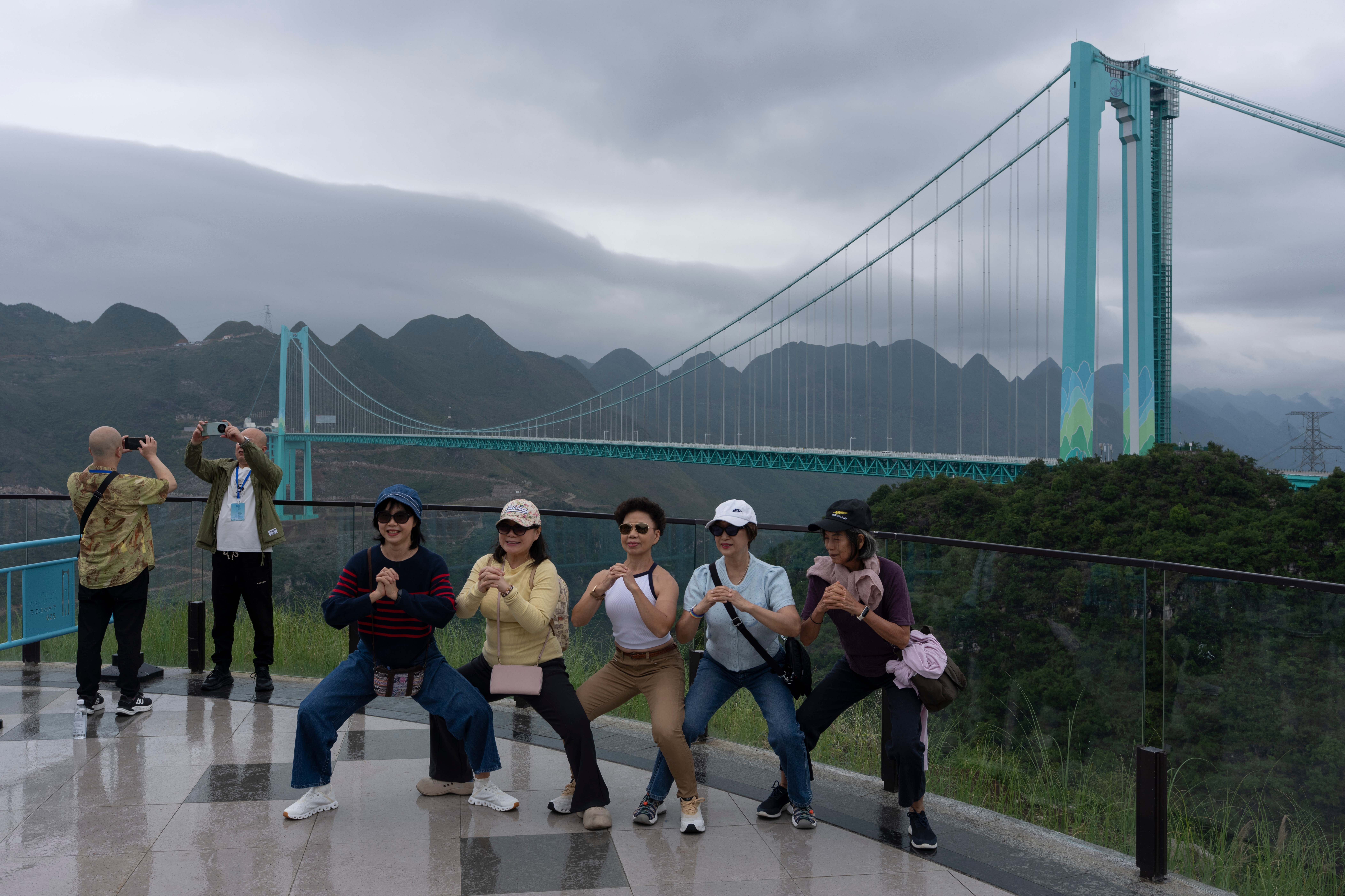 China's highest bridge brings tourists and internet access to remote communities
