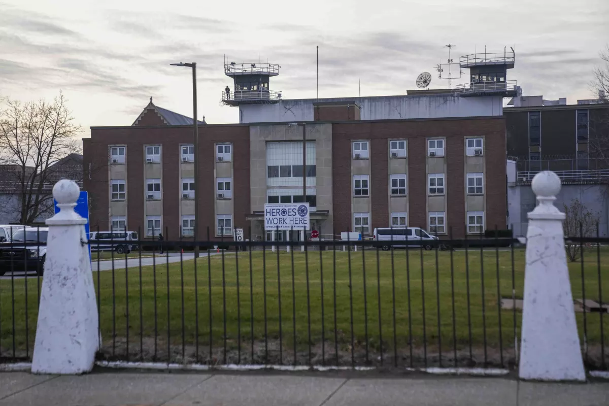The sun sets behind Indiana State Prison on Tuesday, Dec. 17, 2024, in Michigan City, Ind., where, barring last-minute court action or intervention by Gov. Eric Holcomb, Joseph Corcoran, 49, convicted in the 1997 killings of his brother and three other people, is scheduled to be put to death by lethal injection before sunrise on Wednesday.