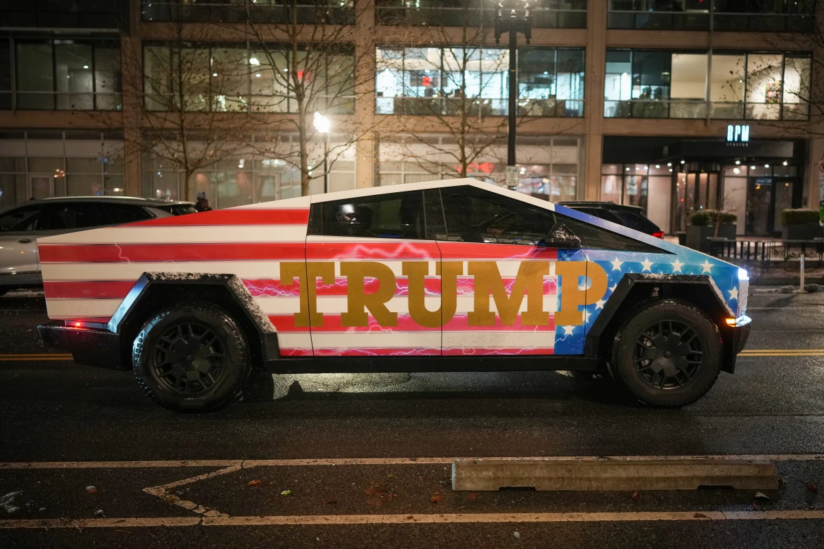 A Tesla Cybertruck emblazoned with 'TRUMP' sits in traffic in Washington, D.C., ahead of President Trump's inauguration in January.
