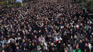 Iranians attend Friday prayers in the courtyard of the Imam Khomeini Grand mosque in Tehran, Iran, Friday, March 6, 2026.