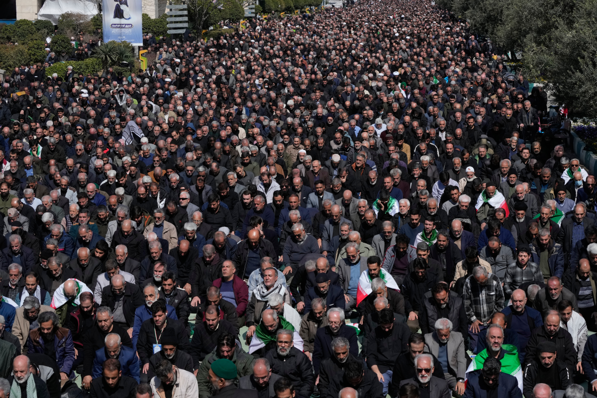 March 6: Iranians attend Friday prayers in the courtyard of the Imam Khomeini Grand mosque in Tehran, Iran.
