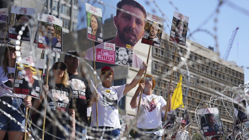Families of hostages protest demanding the release of their loved ones from Hamas captivity in the Gaza Strip at the plaza known as the "hostages square" in Tel Aviv, Israel, Saturday.