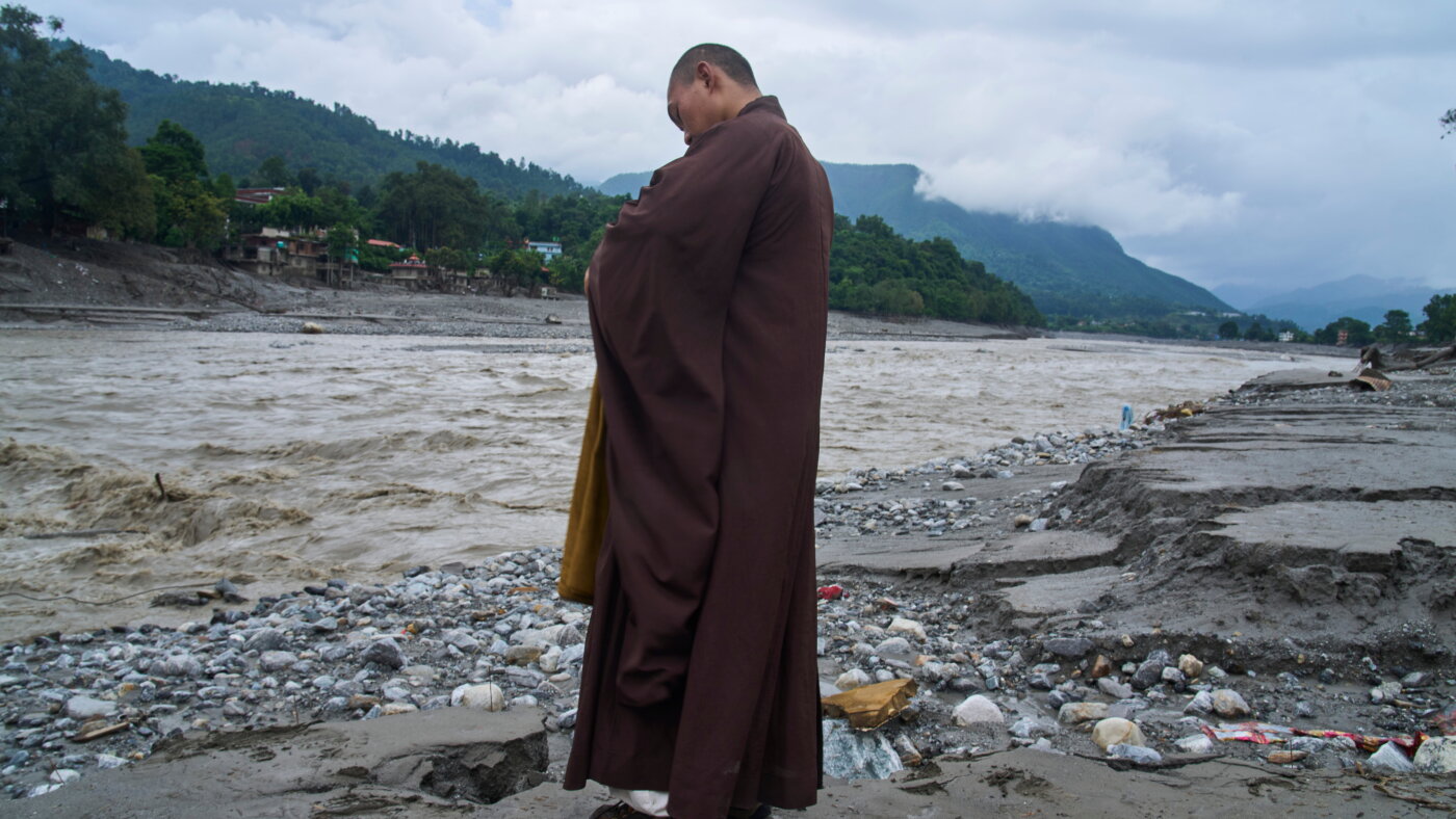 As Nepal identifies those killed in the floods, questions grow over China's reporting