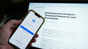 A logon screen for Facebook and the new Meta policy are photographed in Sydney, Australia, on Nov. 20, 2025.