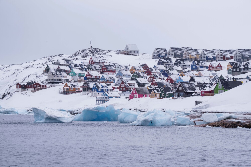 Homes covered by snow are seen from the sea in Nuuk, Greenland, on March 6, 2025. (AP)