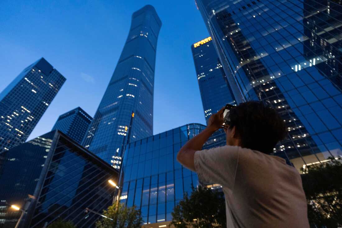 Beijing's tallest building is damaged after small airplane reportedly crashed into it