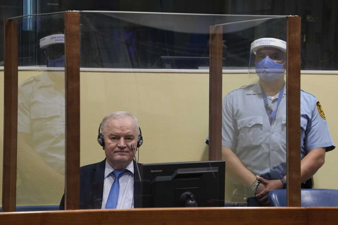 Former Bosnian Serb military chief Ratko Mladic sits in the court room in The Hague, Netherlands, June 8, 2021, where the United Nations court delivers its verdict in the appeal of Mladic against his convictions for genocide and other crimes and his life sentence for masterminding atrocities throughout the Bosnian war.