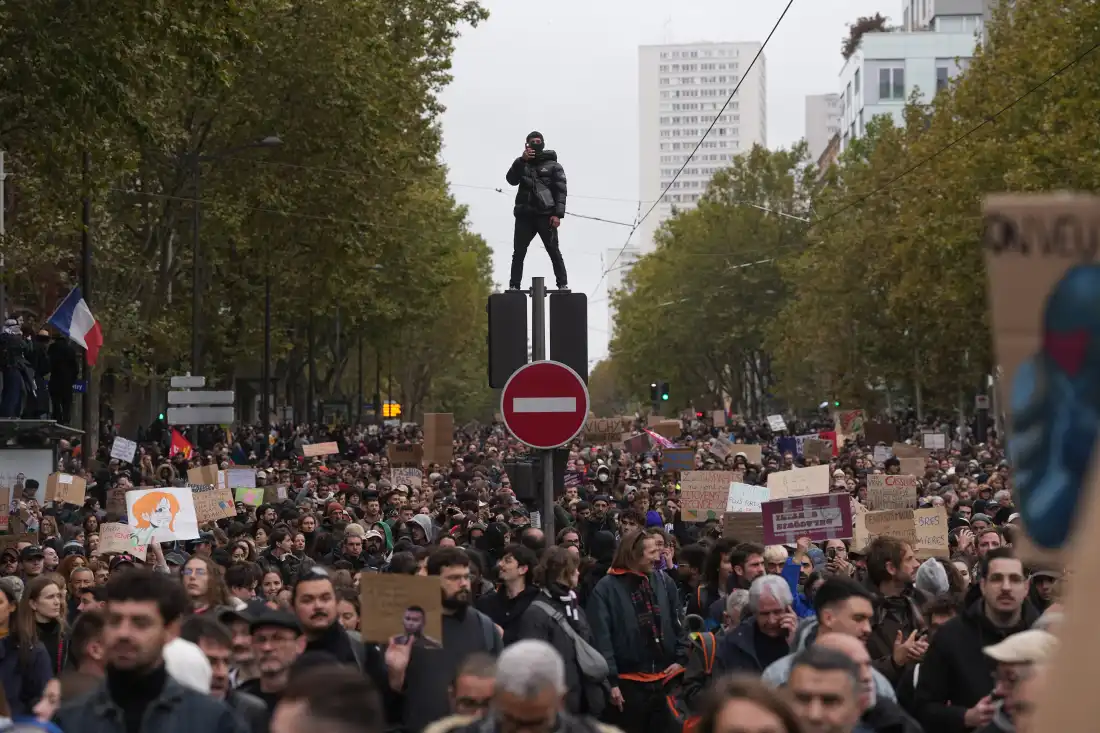 Protesters march during a demonstration against rising living costs in Paris, Saturday, Oct. 24, 2026.