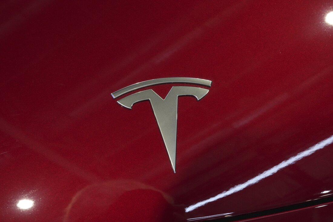 The logo of Tesla car is pictured at the Paris Auto Show, in Paris on Oct. 14, 2024.