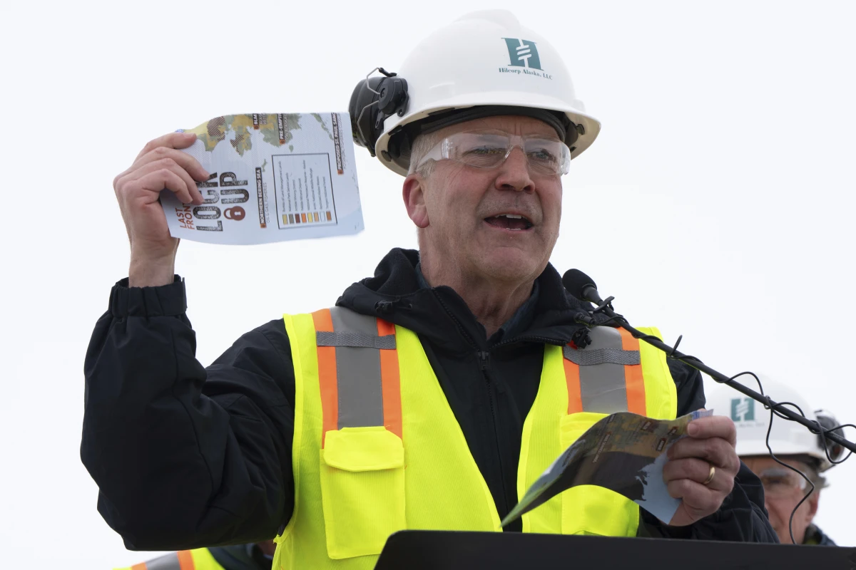 Sen. Dan Sullivan, R-Alaska, rips up a piece of paper that had plans from the Biden administration during a news conference at the Pump Station 1 on Monday, June 2, 2025, located near Deadhorse, Alaska, on the state's prodigious North Slope.
