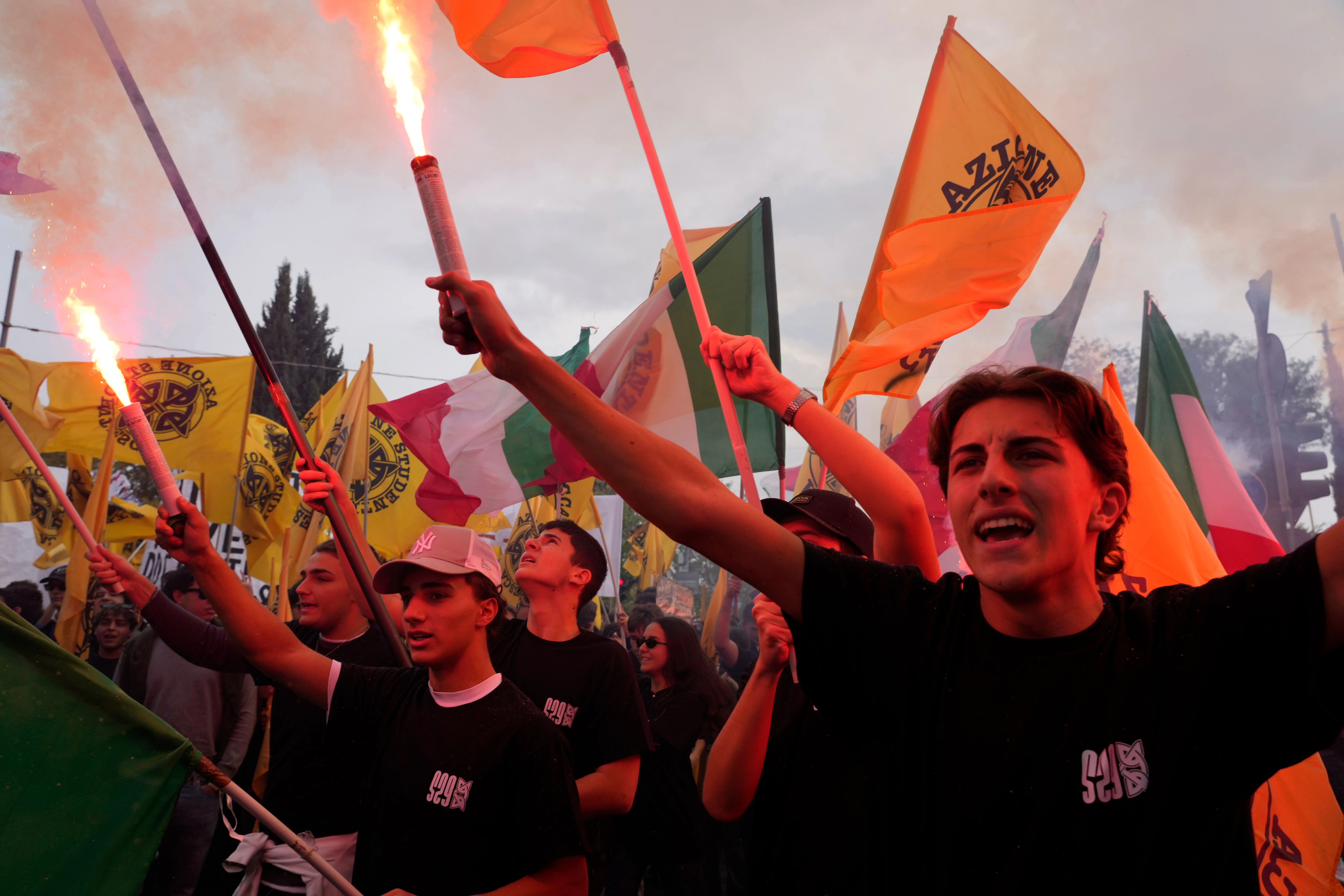 Soldiers guard center of Milan as thousands of protesters march in cities across Europe