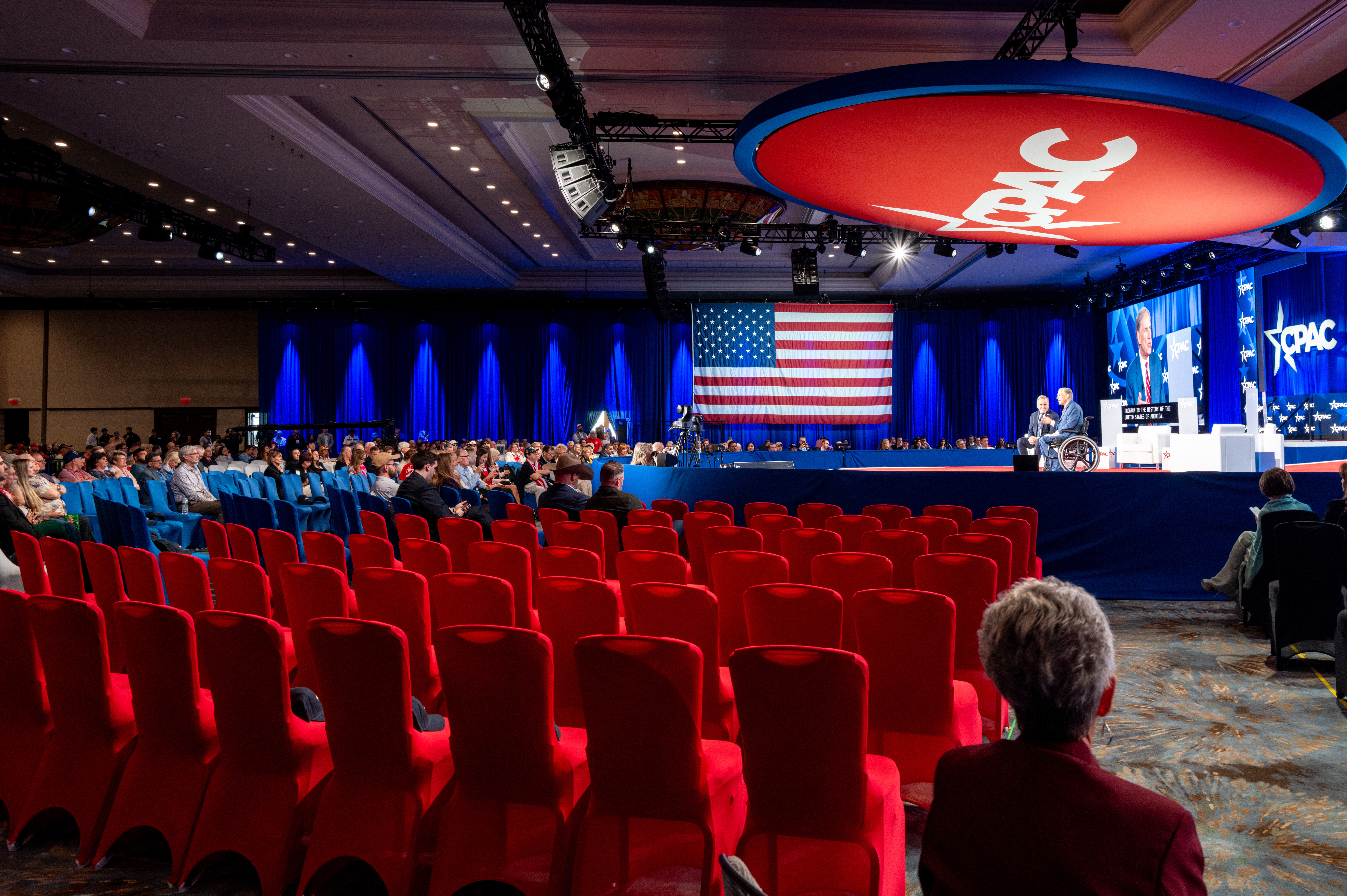 Texas Gov. Greg Abbott speaks during a discussion Friday at the Conservative Political Action Conference, or CPAC.