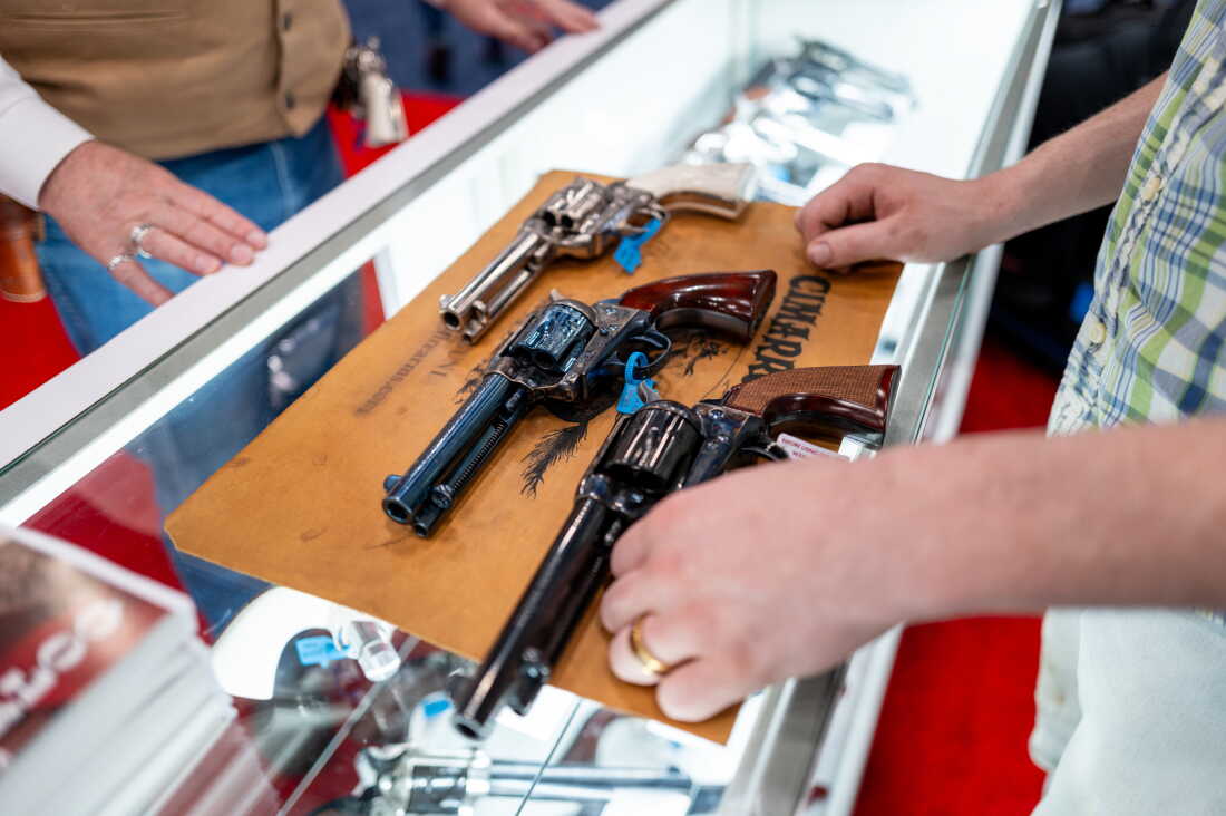 Revolvers are displayed on a countertop during the NRA conference on April 18 in Houston.
