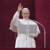 Pope Leo XIV delivers his blessing from the central balcony of St. Peter's Basilica for his first Sunday blessing after his election, in St. Peter's Square at the Vatican, Sunday, May 11, 2025.