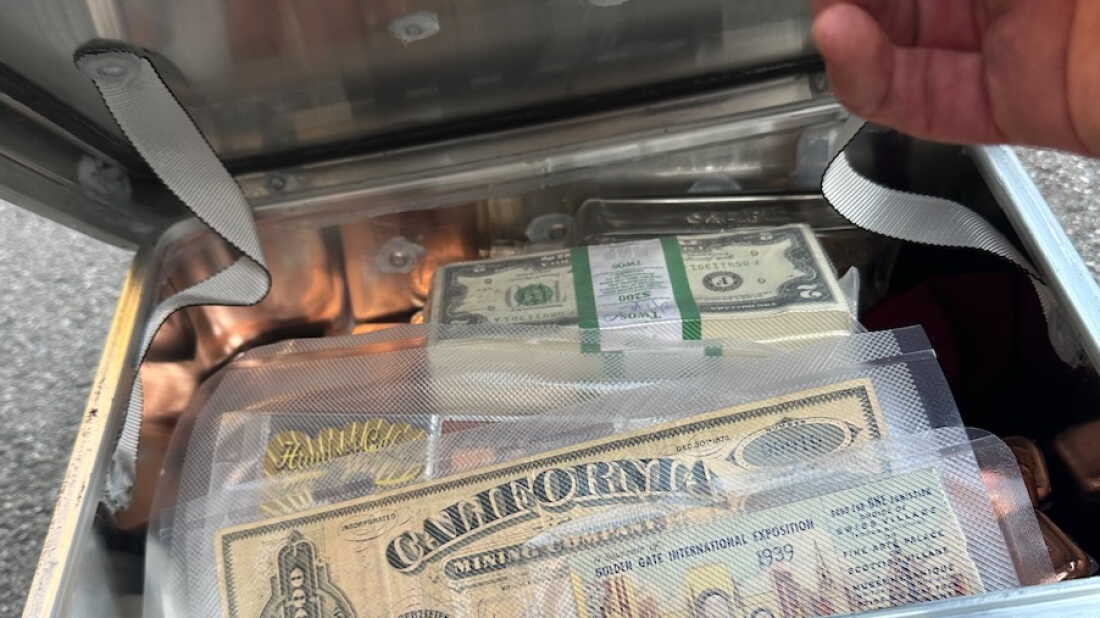 This metal box containing around $10,000 of gold, currency, and historic San Francisco artifacts was found late on May 13 on West Ridge Trail in Mount Sutro Open Space Reserve, San Francisco.