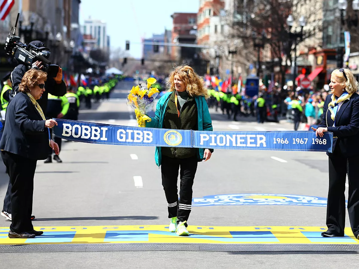 Bobbi Gibb crosses the finish line during the Boston Marathon in 2016, 50 years after she became the first woman to complete the race.