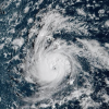 Hurricane Nolo is seen approaching Hawaii's islands, in this satellite image captured Friday. Nolo is expected to avoid making landfall as it strengthens, but forecasters warn it will bring dangerous flooding rains.