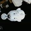 This screengrab from video provided by NASA TV shows the SpaceX Dragon capsule departing from the International Space Station shortly after undocking with four NASA Crew-11 members inside on Wednesday, Jan. 14, 2026.