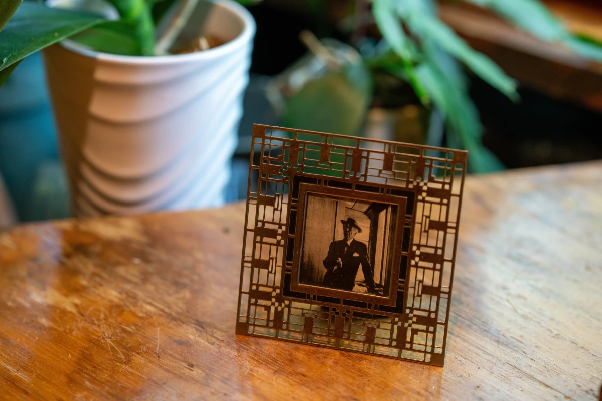 A framed photo of architect Frank Lloyd Wright.