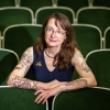 Classicist and translator Emily Wilson published a critical review of Christopher Nolan's The Odyssey in the London Review of Books. Wilson has loved Greek myths since childhood and has translated both the Iliad and Odyssey. She has tattoos of a spear on one leg and a bow on the other — she says they represent Achilles and Odysseus.