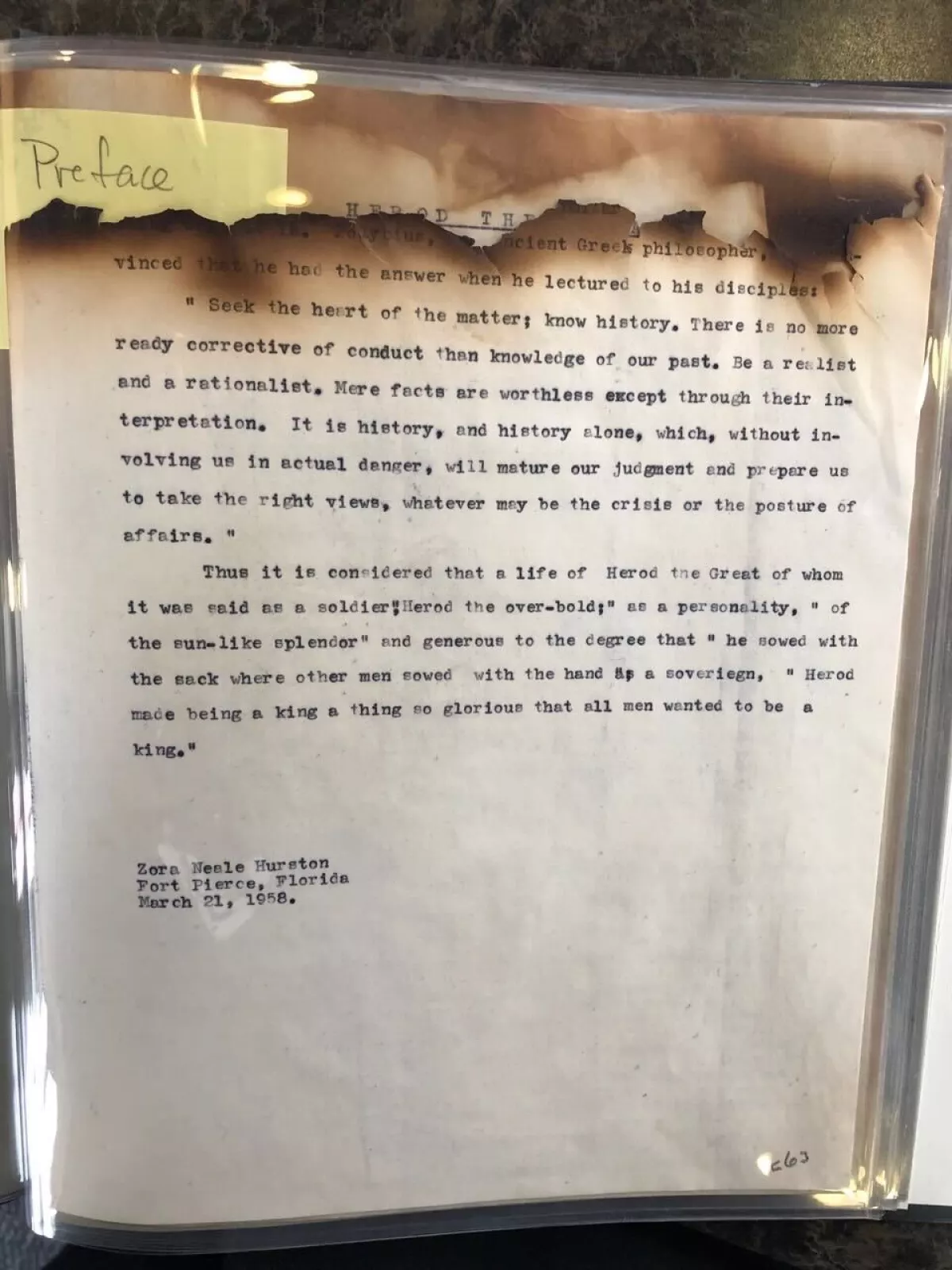 A partially burned page of the preface written by Hurston.