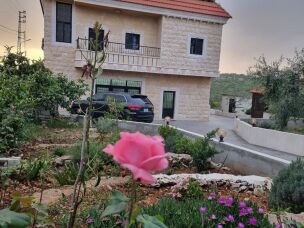 Mazen Farah's family home in Yaroun, southern Lebanon, which satellite images showed was destroyed during the conflict.