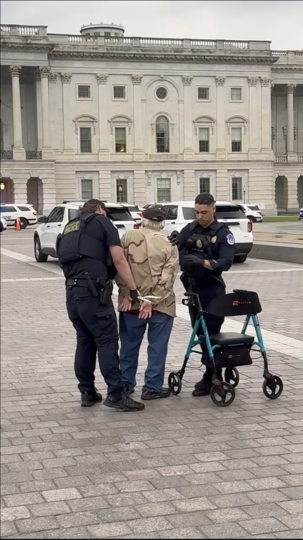 This screenshot shows the June 13, 2025, arrest of John Spitzberg at the U.S. Capitol in Washington, D.C.