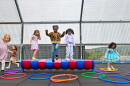 Kindergarten students in the St. Clair Area School District play on the rooftop playground during recess.