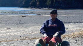 Charles Barker enjoys a sunny day at the beach.