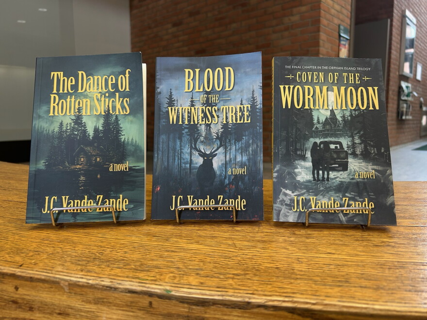 All three books in the Orphan Island trilogy written by J.C. Vande Zande