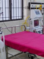 A staffer checks on a ventilator in an intensive care unit in Chennai, India, Friday. States in the U.S. are coming up with plans for what to do if they run out of ventilators and other supplies.