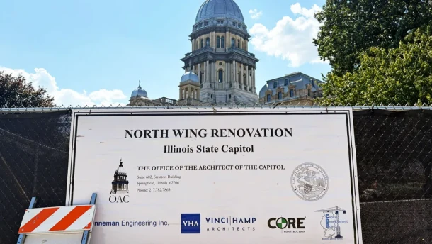 A sign shows the parties involved in construction on the north wing of the Illinois State Capitol.