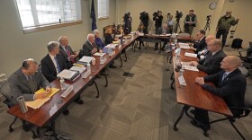Members of the Sagadahoc County Sheriff's Department, seated at table at right, are questioned, Thursday, Jan. 25, 2024, in Augusta, Maine, during a hearing of the independent commission investigating the law enforcement response to the mass shooting in Lewiston, Maine.(AP Photo/Robert F. Bukaty)