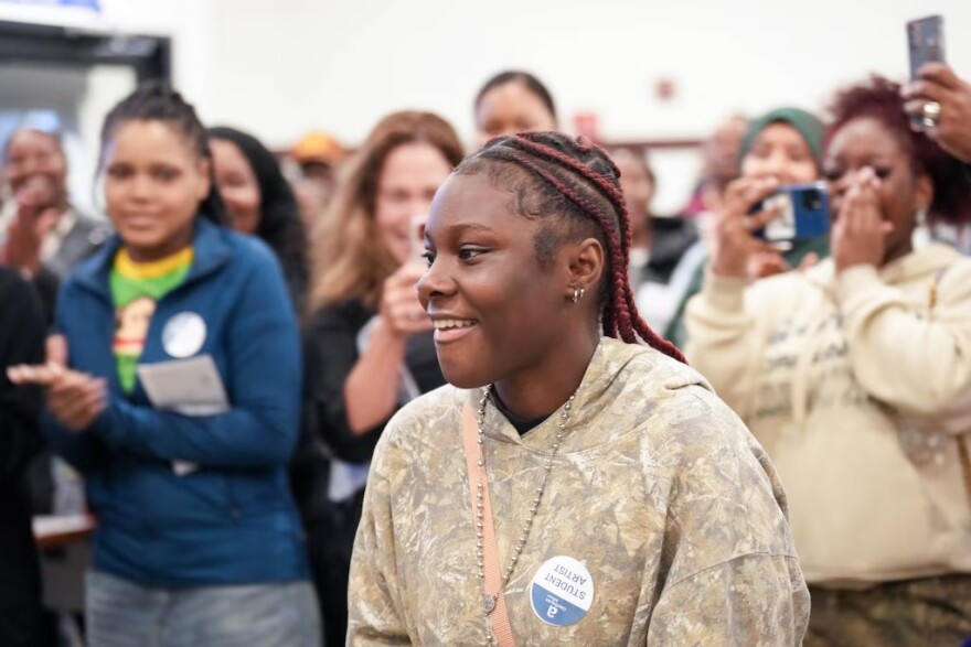 Baltimore Polytechnic Institute’s Jaylyn Walker is announced as the winner of the annual Courting Art Baltimore contest. (Ulysses Muñoz/The Baltimore Banner)