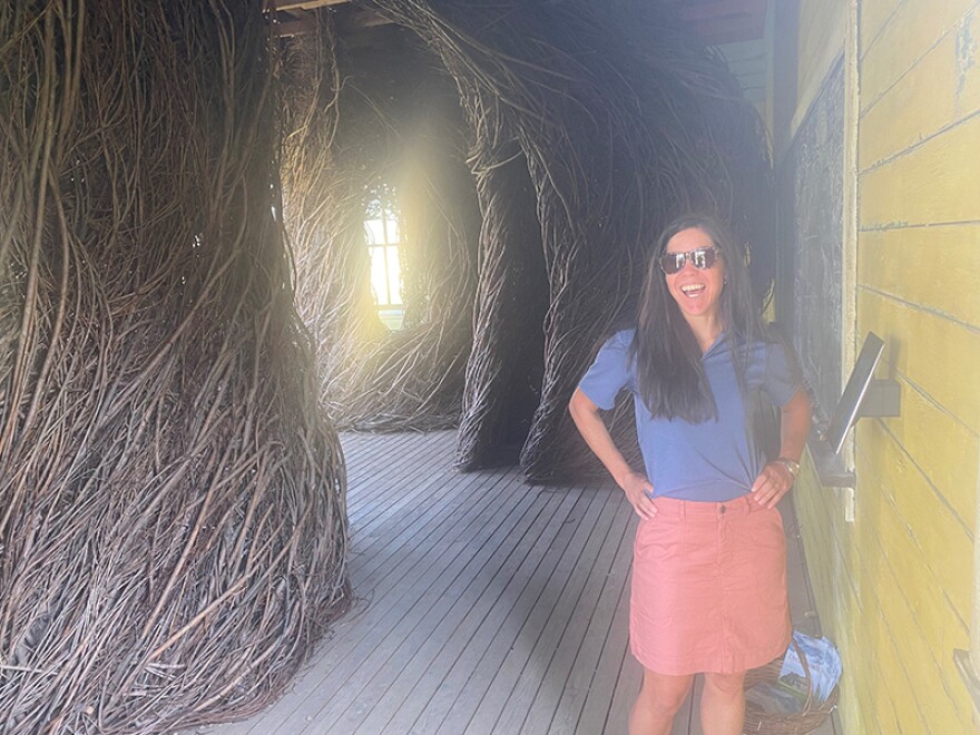 Lindsey Hinmon, co-director of Tippet Rise, pictured inside Daydreams, a 2015 sculpture by Patrick Dougherty. In 2021, the center added poetry audio inside the installation