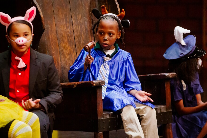 Jeffrey Parks plays the role of the judge on Tuesday, Nov. 29, 2022, during a performance of “The Big Bad Day,” an original opera written by Jefferson School third graders, at the Touhill Performing Arts Center.