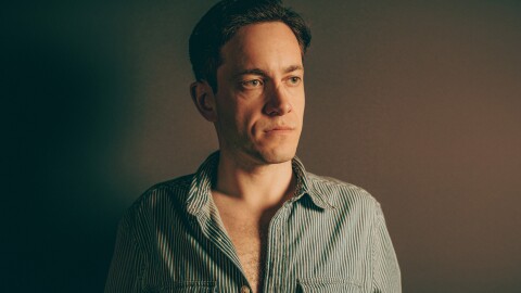 Ed Zitron stares pensively into the distance.