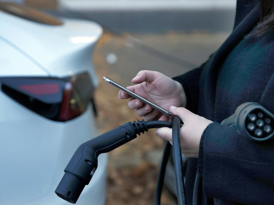 Tesla drivers can unlock and start their vehicle from the smart phones, which became problematic when the app refused to work Friday. (Photo by Carsten Koall/Getty Images)