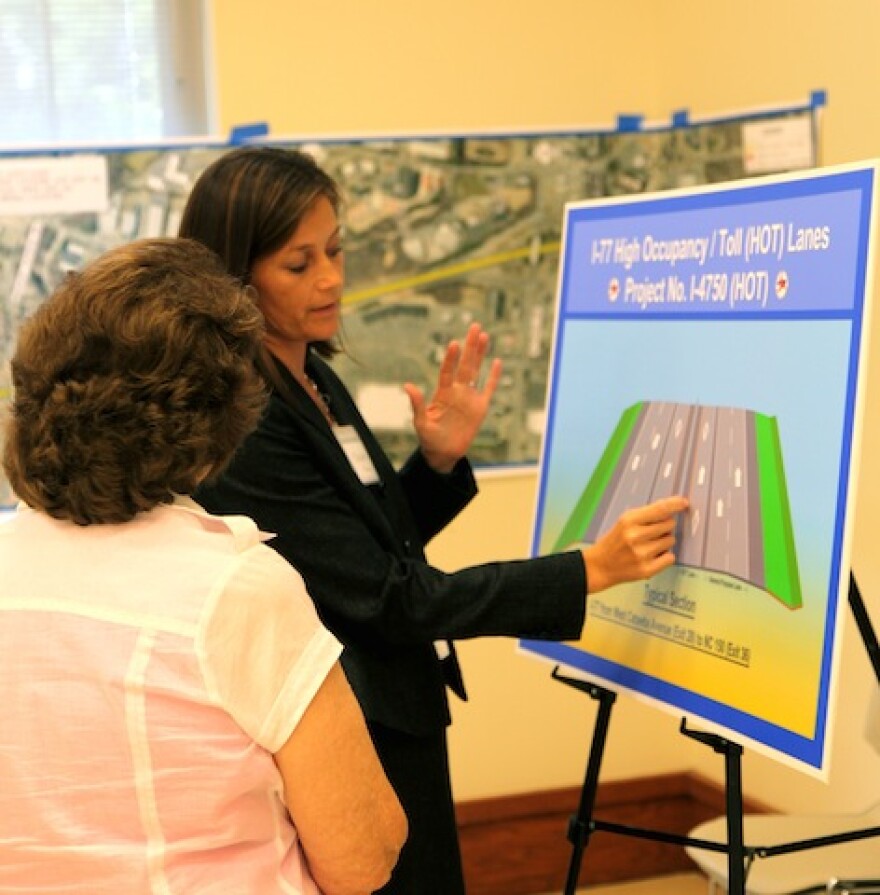 NCDOT officials and members of the transportation consulting firm RK & K answered questions about the project. Photo: Tanner