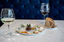At Vintage '78 Wine Bar, The Cheese Clock offers an opportunity to try 12 different cheeses and accoutrements on one plate.